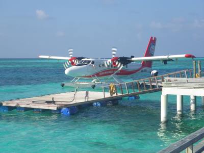 Seaplane arrives at the resort in the Maldives, Atmosphere Kanifushi.