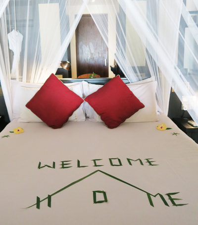 The bed on arrival at the resort at Atmosphere Kanifushi.