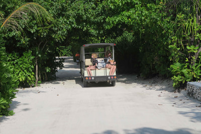 golf cart transport to get around Atmosphere Kanifushi, Maldives